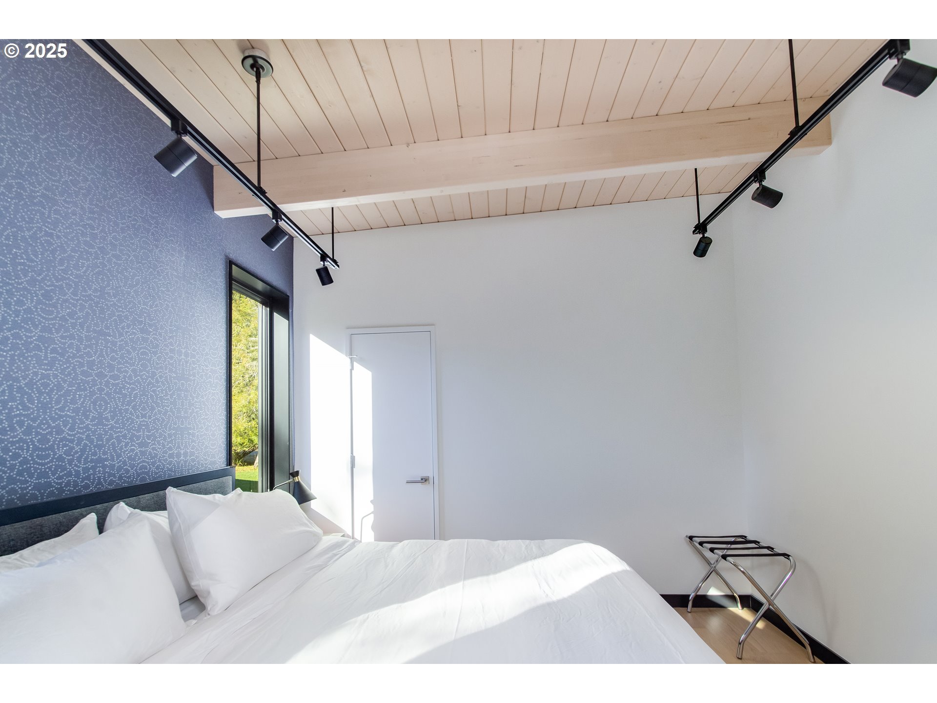 288 Baker Road Randle, WA 98377 - Photo 35 of 48 a bedroom with a bed and a window