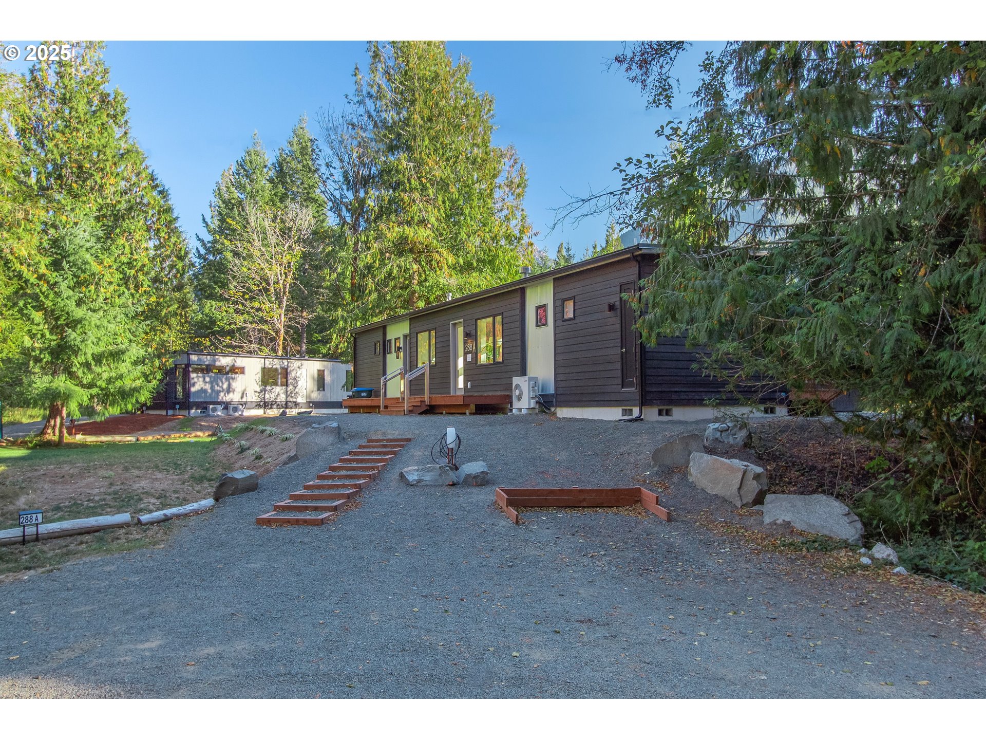 288 Baker Road Randle, WA 98377 - Photo 4 of 48 a backyard of a house with table and chairs
