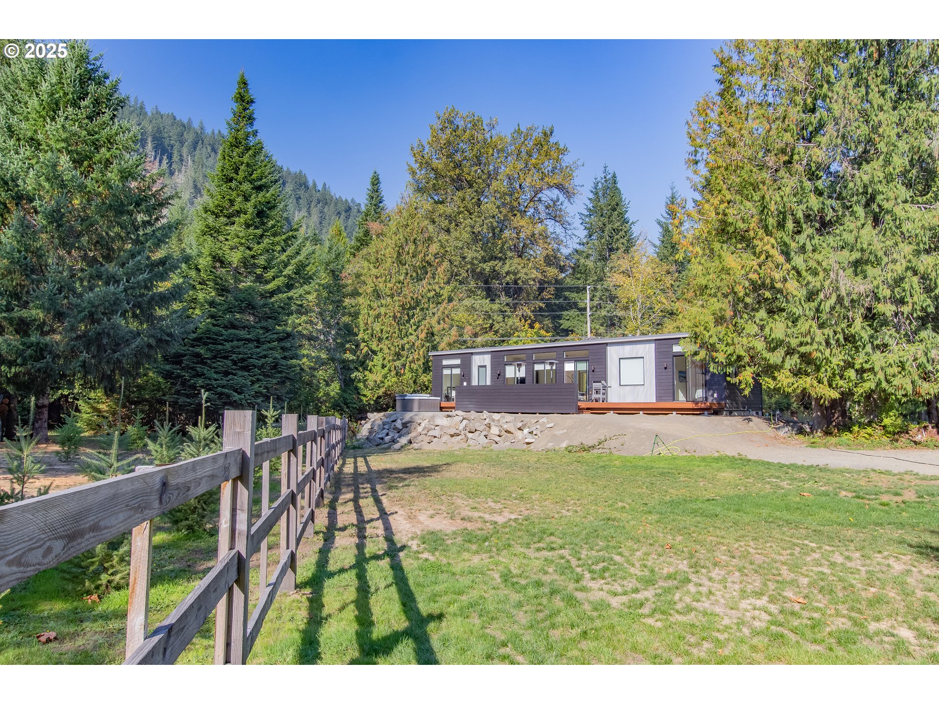 288 Baker Road Randle, WA 98377 - Photo 5 of 48 a view of a deck in the middle of a yard