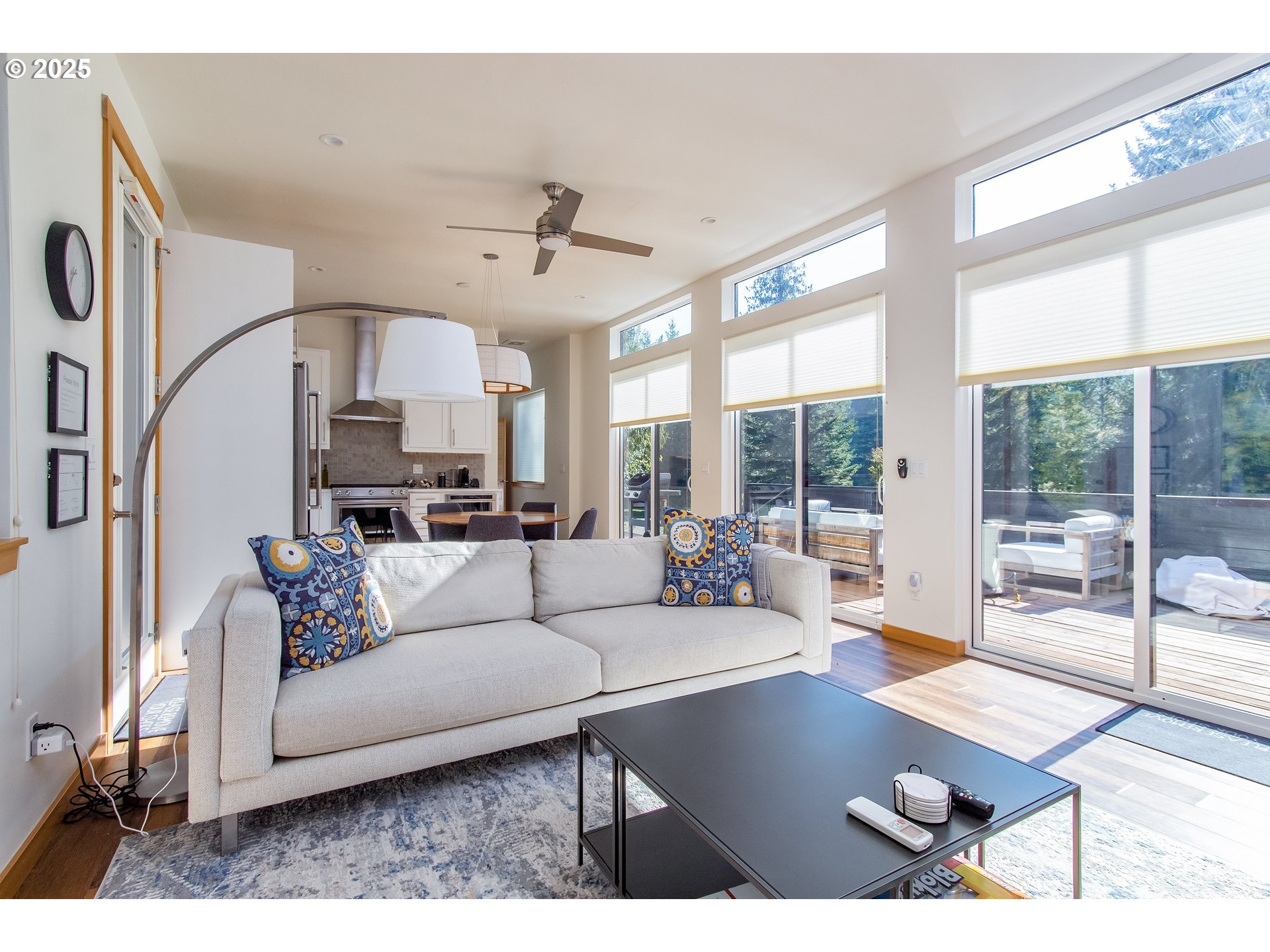 288 Baker Road Randle, WA 98377 - Photo 10 of 48 a living room with furniture ceiling fan and a large window