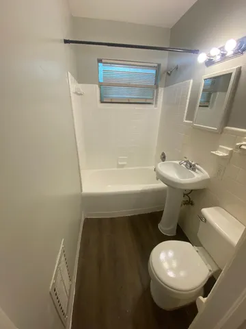 a bathroom with a sink and a toilet
