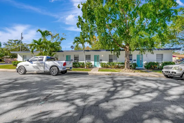 a car parked in front of a house