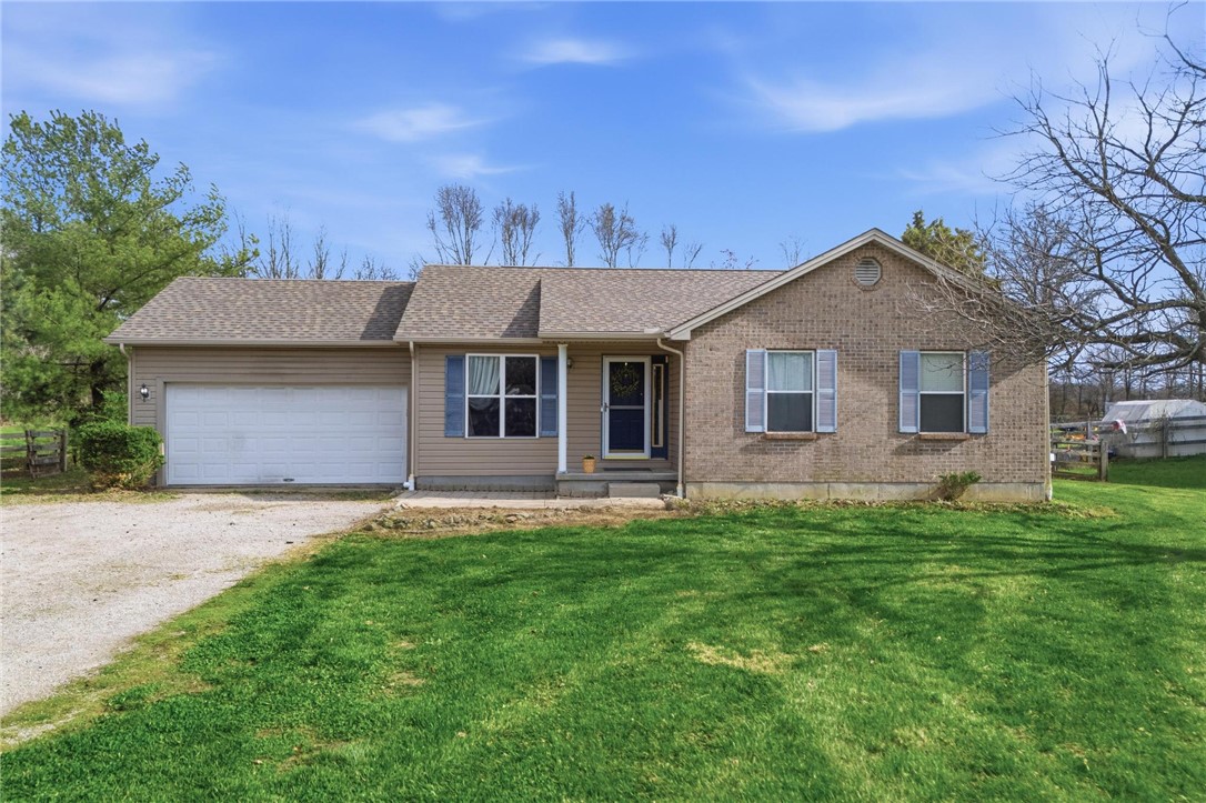 8747 Waynes Way Blanchester, OH 45107 - Photo 1 of 40 This charming home offers comfortable living with a spacious front yard and attached garage.