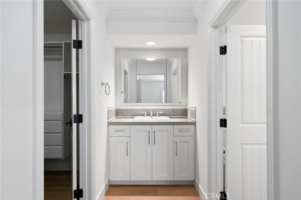 33 Cassis Dana Point, CA 92629 - Photo 20 of 49 a bathroom with a sink and a mirror