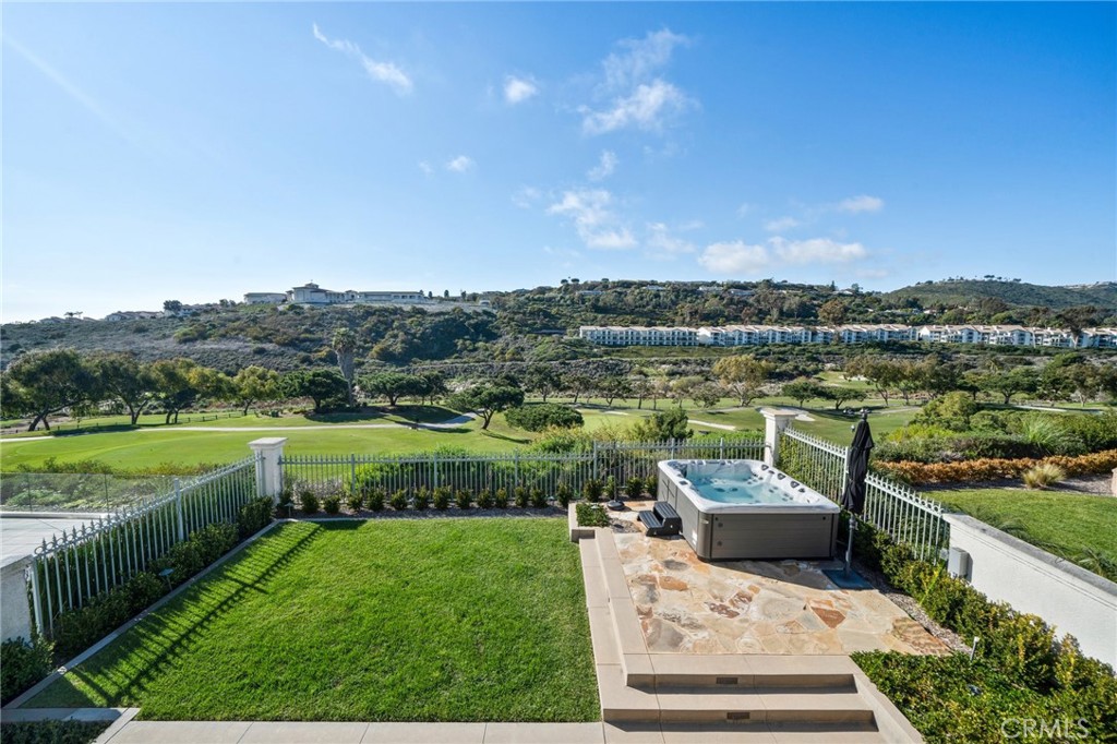 33 Cassis Dana Point, CA 92629 - Photo 25 of 49 a view of a garden and lake view