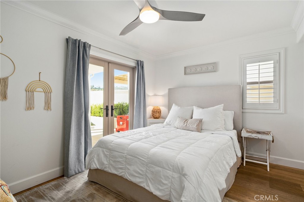 33 Cassis Dana Point, CA 92629 - Photo 33 of 49 a bedroom with a bed and a large window