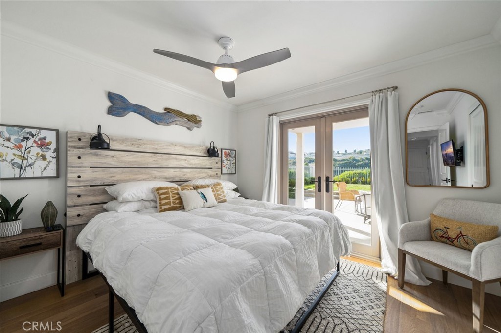 33 Cassis Dana Point, CA 92629 - Photo 36 of 49 a bedroom with a large bed and a window