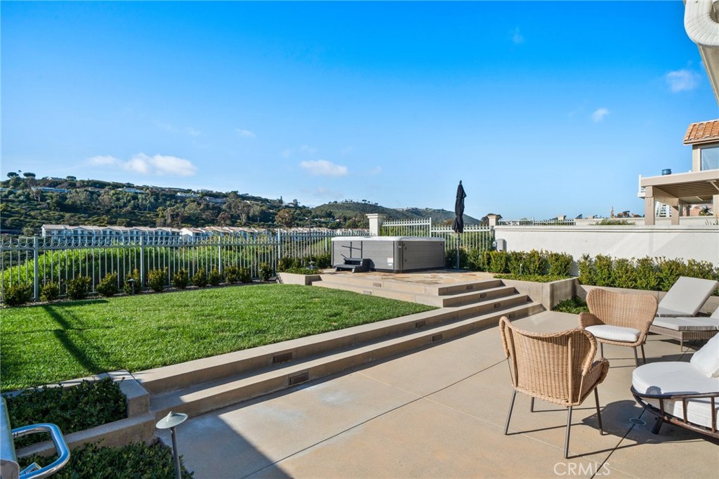 33 Cassis Dana Point, CA 92629 - Photo 39 of 49 a view of a chairs and table on the terrace