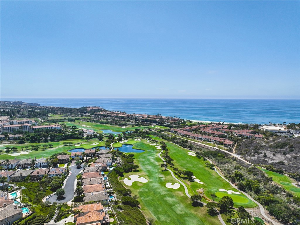 33 Cassis Dana Point, CA 92629 - Photo 4 of 49 an aerial view of a houses with a yard