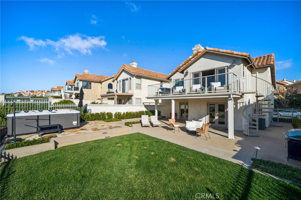 33 Cassis Dana Point, CA 92629 - Photo 43 of 49 a view of a house with backyard porch and sitting area