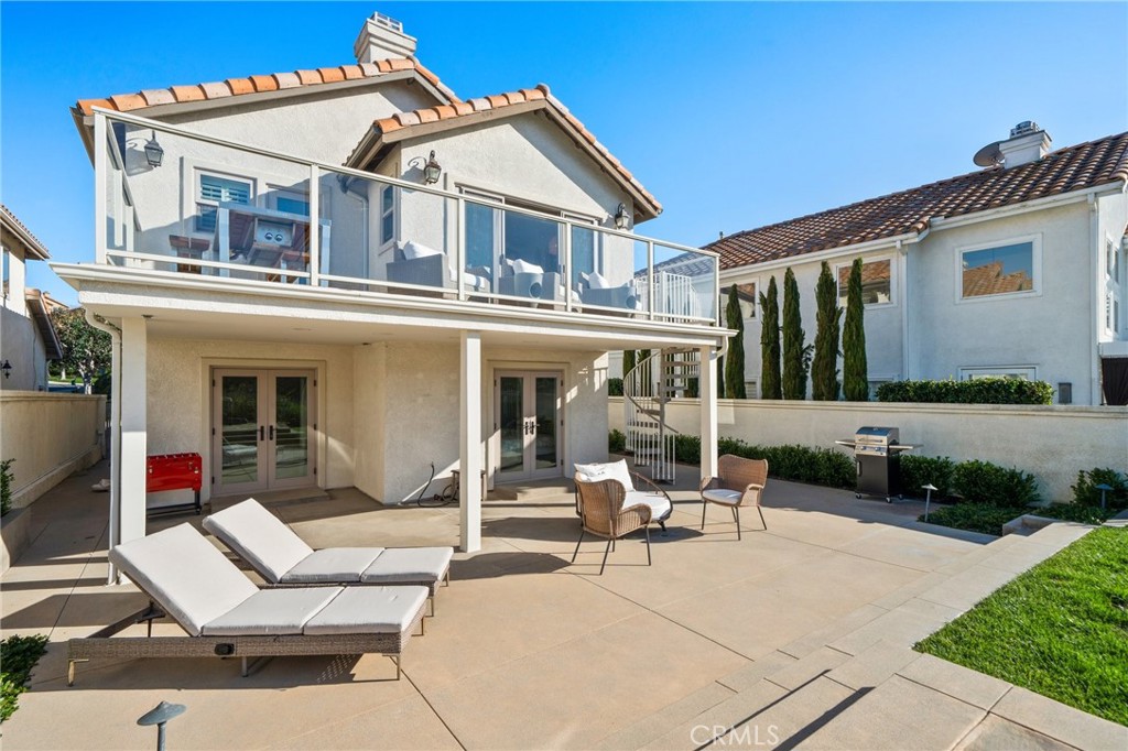 33 Cassis Dana Point, CA 92629 - Photo 46 of 49 front view of a house with a patio
