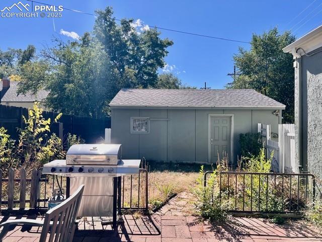 1819 East Yampa Street Colorado Springs, CO 80909 - Photo 16 of 25 a view of a house with a yard
