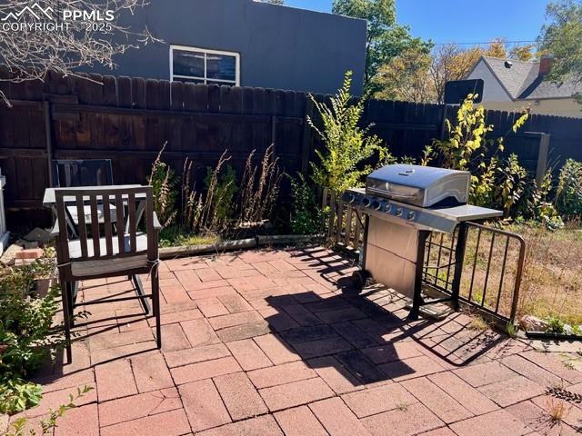 1819 East Yampa Street Colorado Springs, CO 80909 - Photo 17 of 25 a view of a chairs and table on the patio