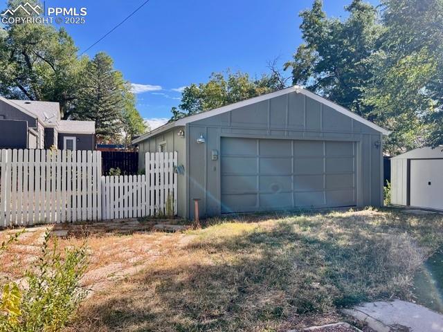 1819 East Yampa Street Colorado Springs, CO 80909 - Photo 18 of 25 a front view of a house with a garage