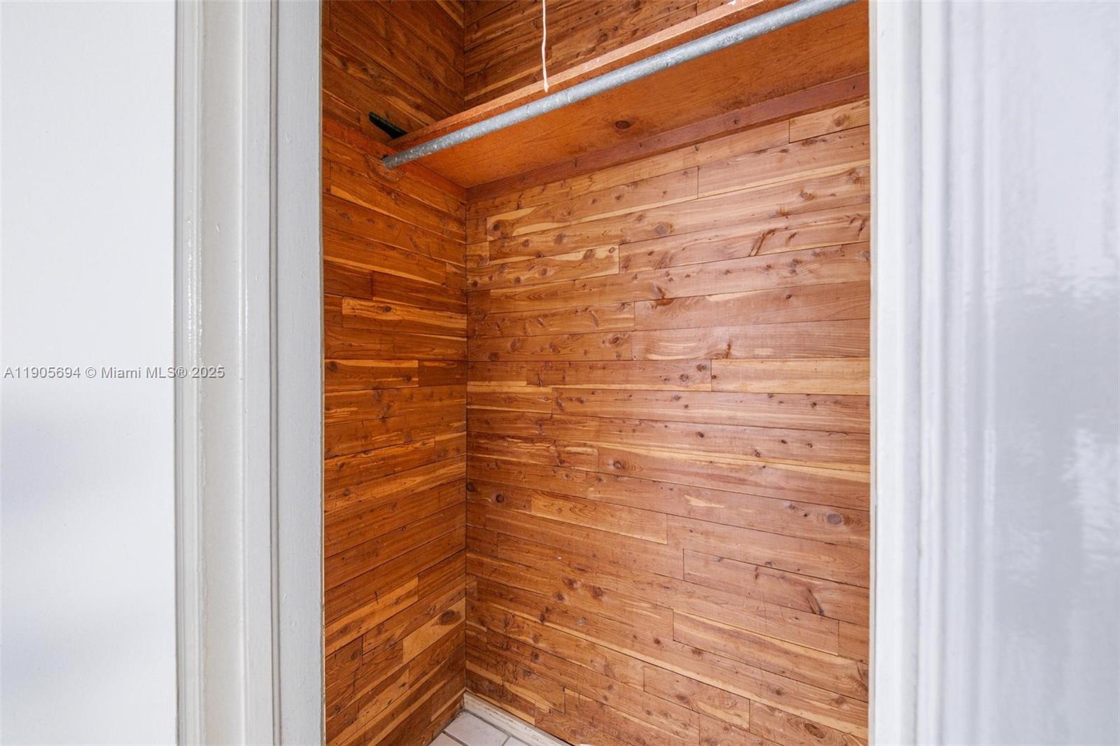 7712 Byron Avenue, Unit 2 Miami Beach, FL 33141 - Photo 17 of 24 a bathroom with a shower