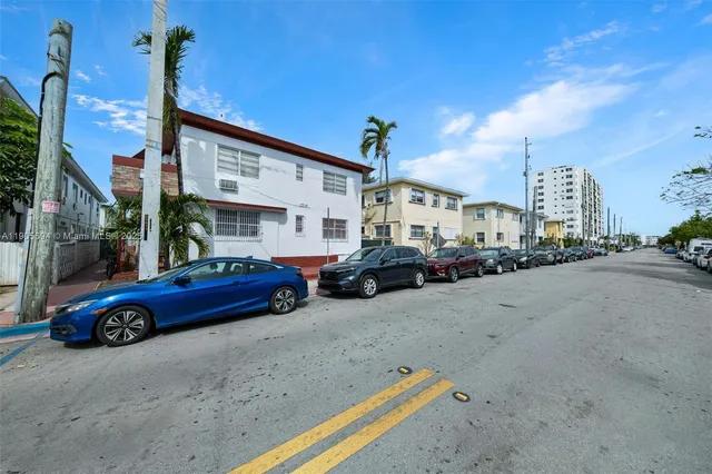 a car parked in front of a house
