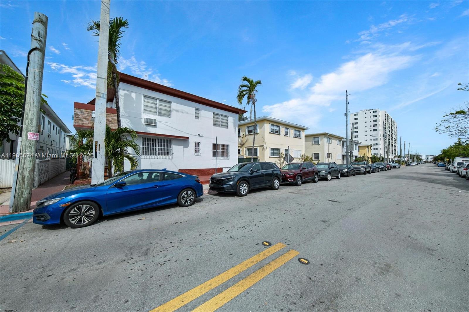 7712 Byron Avenue, Unit 2 Miami Beach, FL 33141 - Photo 24 of 24 a car parked in front of a house