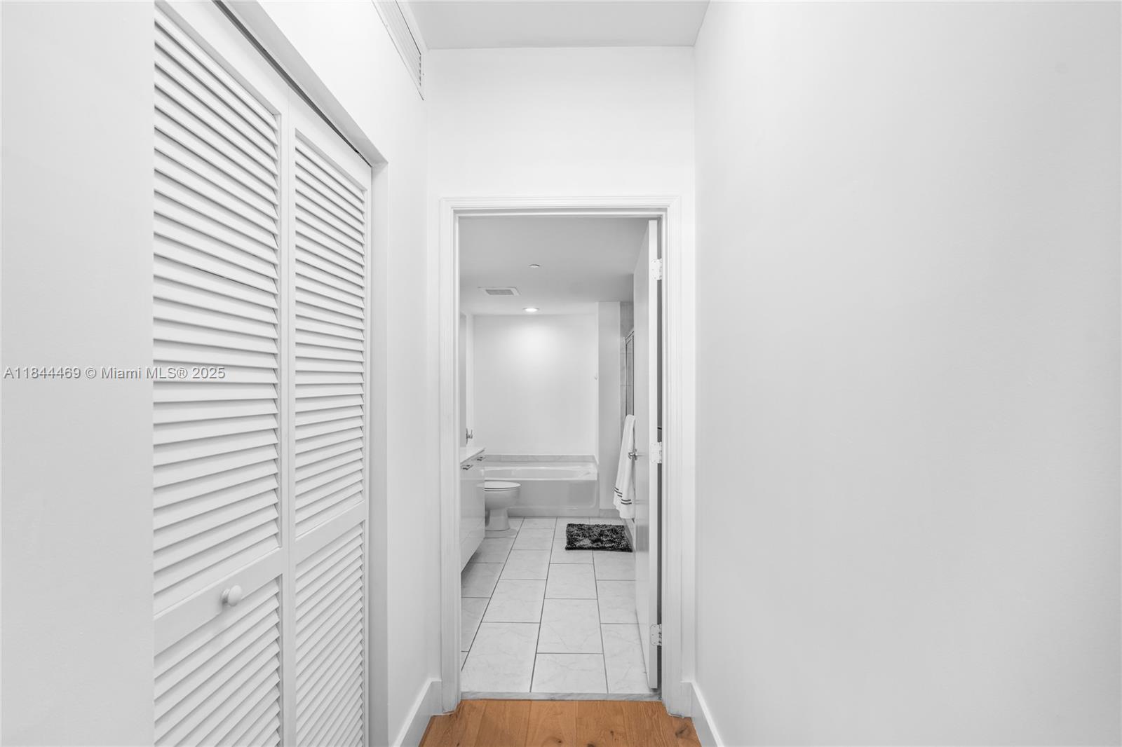 951 Brickell Avenue, Unit 1505 Miami, FL 33131 - Photo 25 of 48 a bathroom with a sink and a toilet