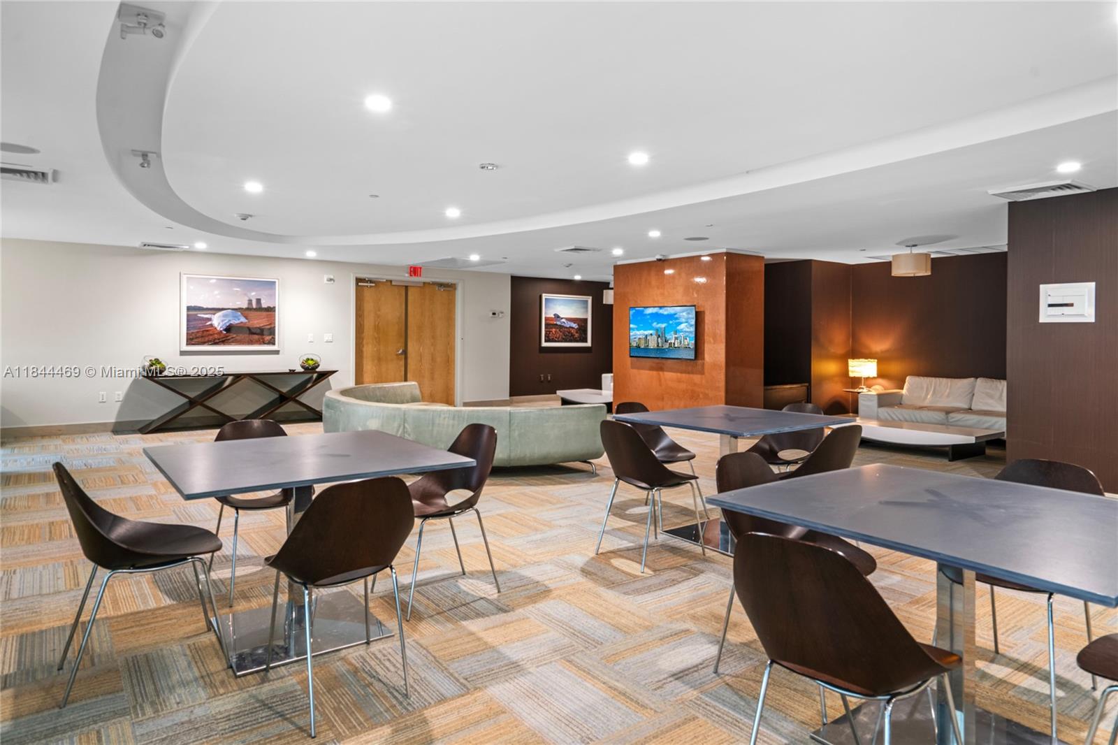 951 Brickell Avenue, Unit 1505 Miami, FL 33131 - Photo 46 of 48 a living room with furniture kitchen view and a large window