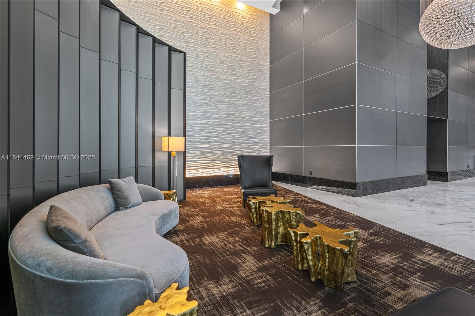 951 Brickell Avenue, Unit 1505 Miami, FL 33131 - Photo 48 of 48 a living room with furniture and a wooden floor