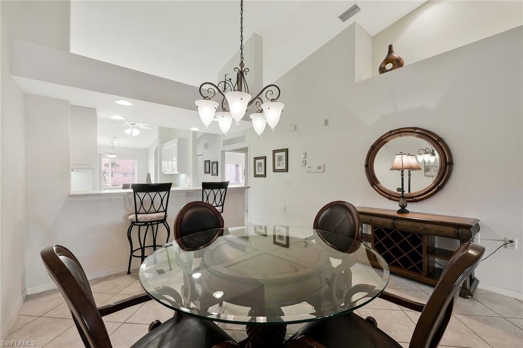 2395 Bayou Lane, Unit 7304 Naples, FL 34112 - Photo 11 of 27 DINING ROOM
