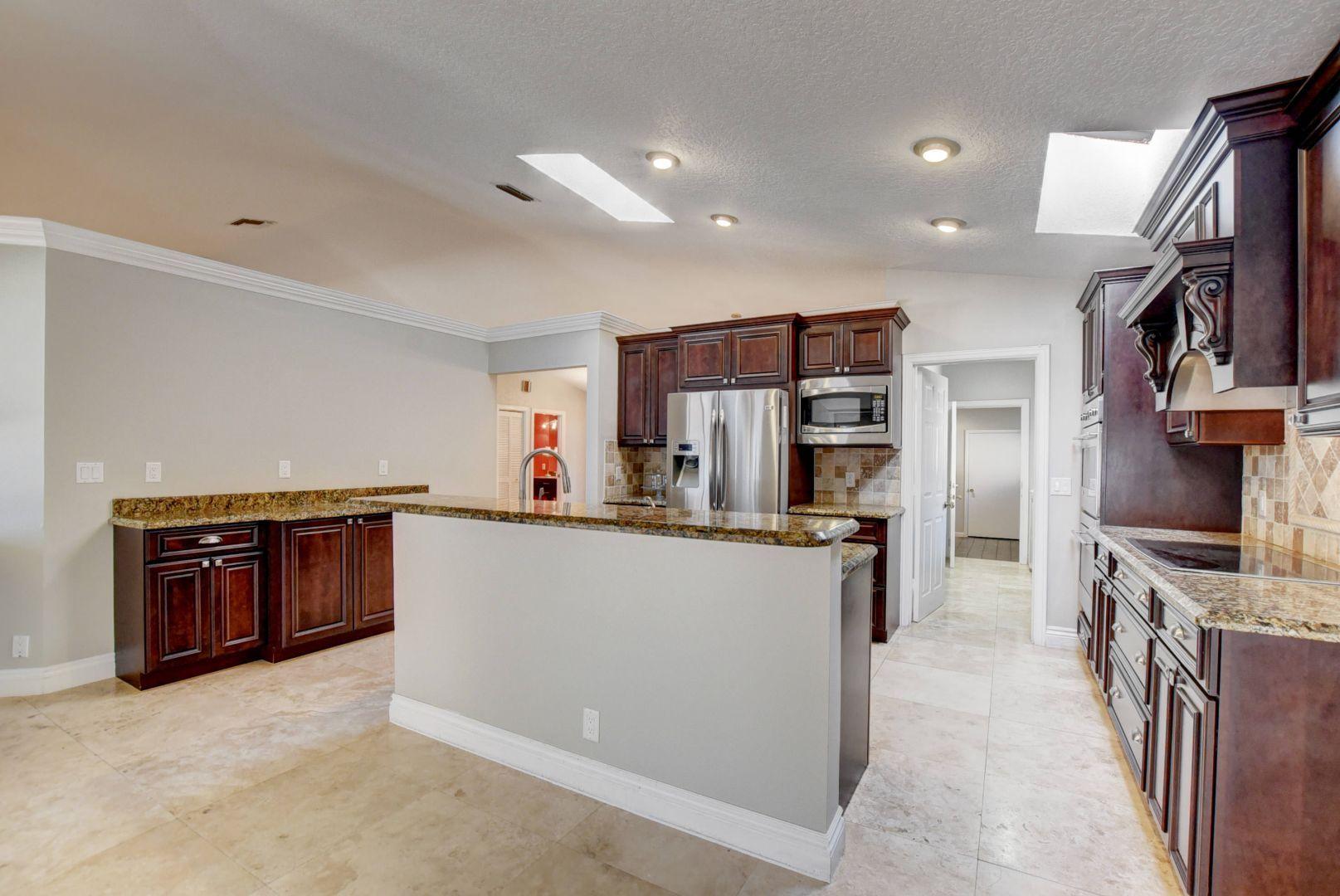 1598 Southwest 5th Avenue Boca Raton, FL 33432 - Photo 5 of 51 Kitchen freshly painted