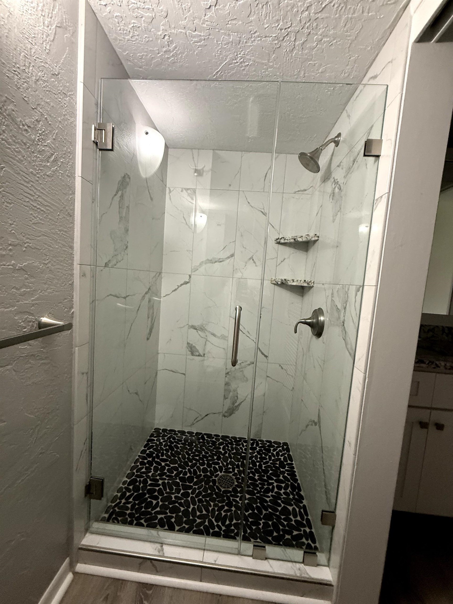 3543 Lower Honoapiilani Road, Unit H103 Lahaina, HI 96761 - Photo 23 of 50 a bathroom with a glass door shower