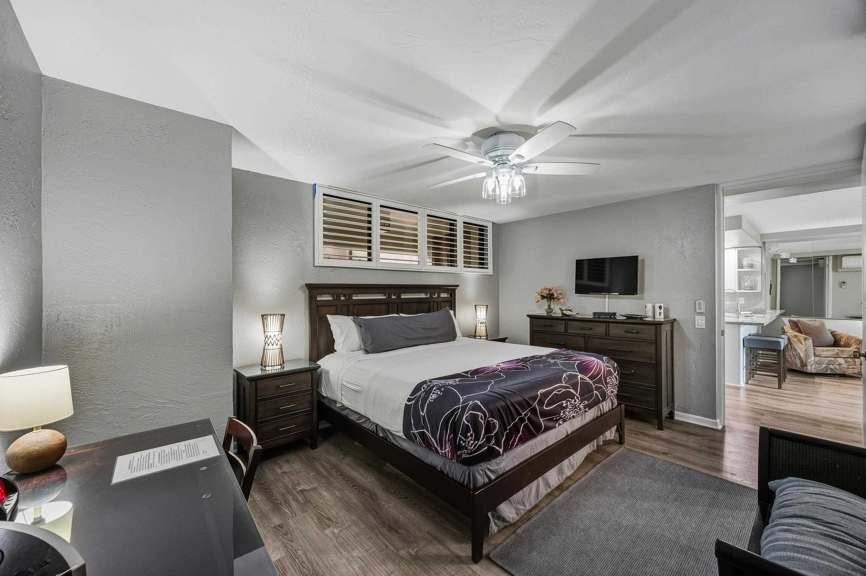 3543 Lower Honoapiilani Road, Unit H103 Lahaina, HI 96761 - Photo 26 of 50 a bedroom with a bed and a couch