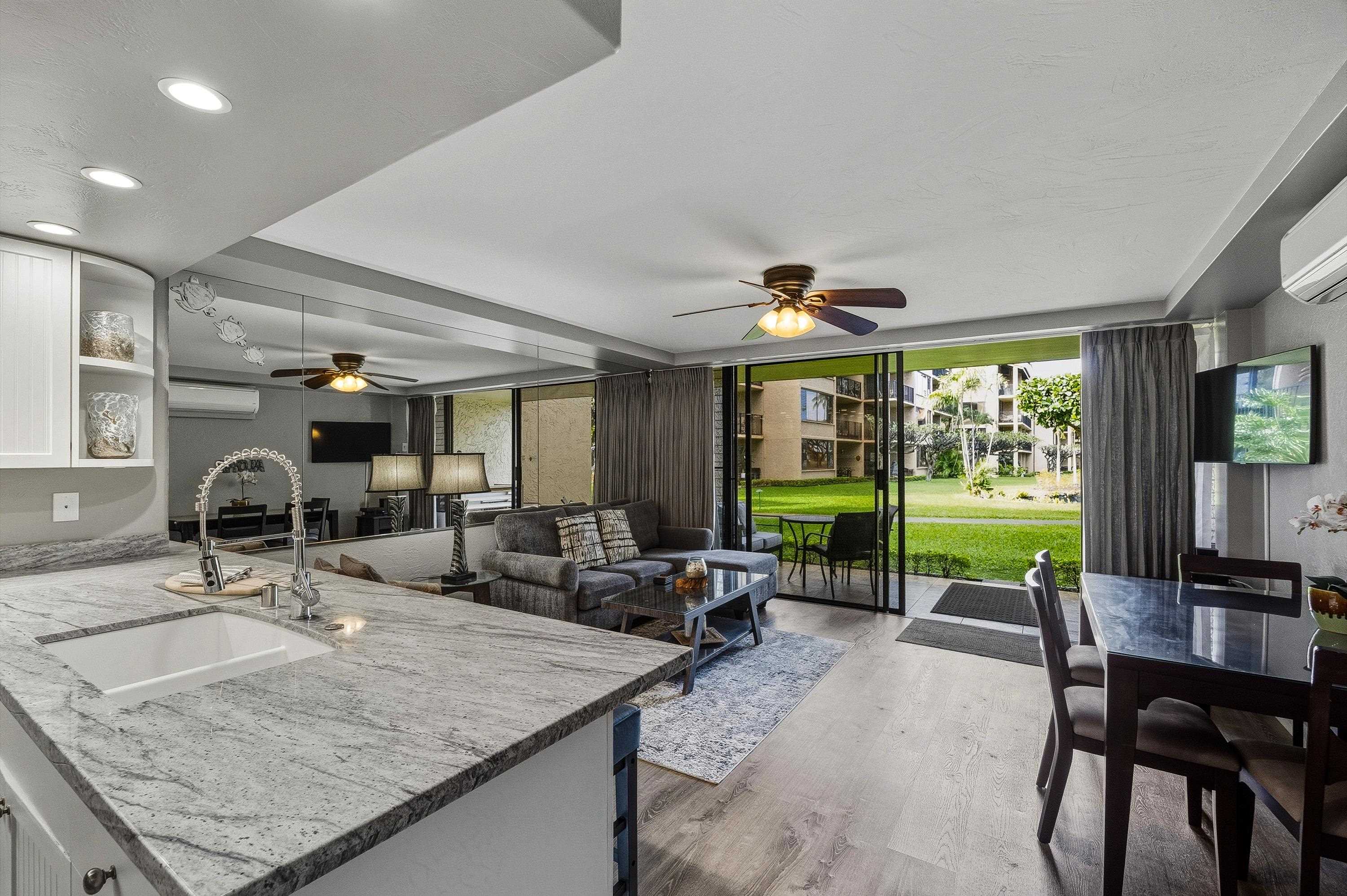 3543 Lower Honoapiilani Road, Unit H103 Lahaina, HI 96761 - Photo 3 of 50 a view of a livingroom with furniture window and outside view