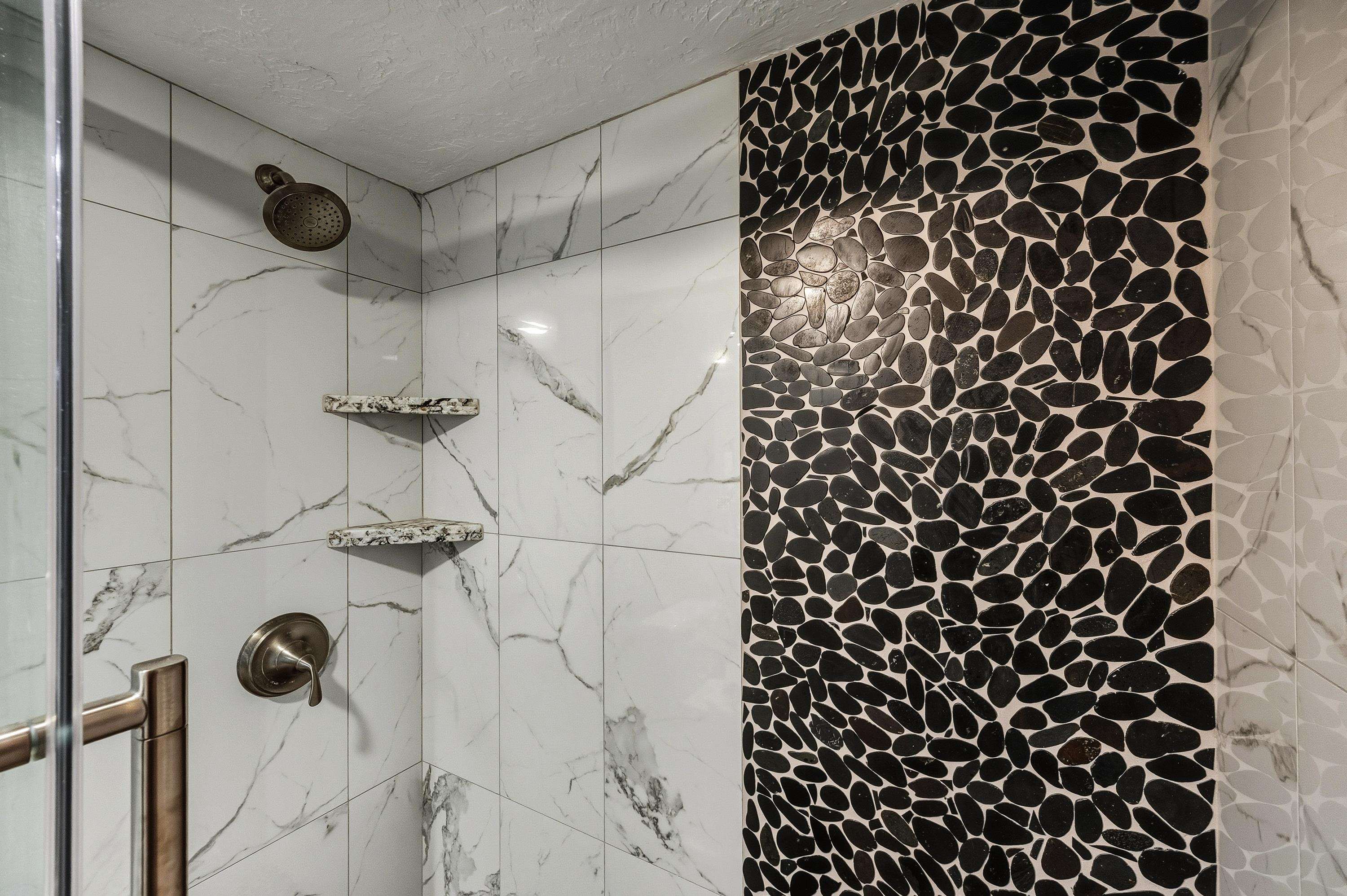 3543 Lower Honoapiilani Road, Unit H103 Lahaina, HI 96761 - Photo 32 of 50 a bathroom with a shower