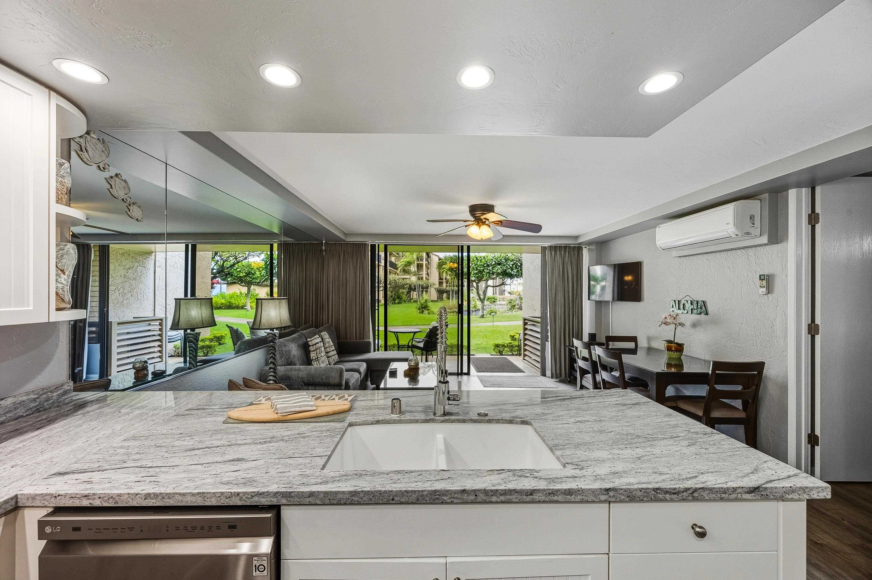 3543 Lower Honoapiilani Road, Unit H103 Lahaina, HI 96761 - Photo 10 of 50 a view of living room and kitchen