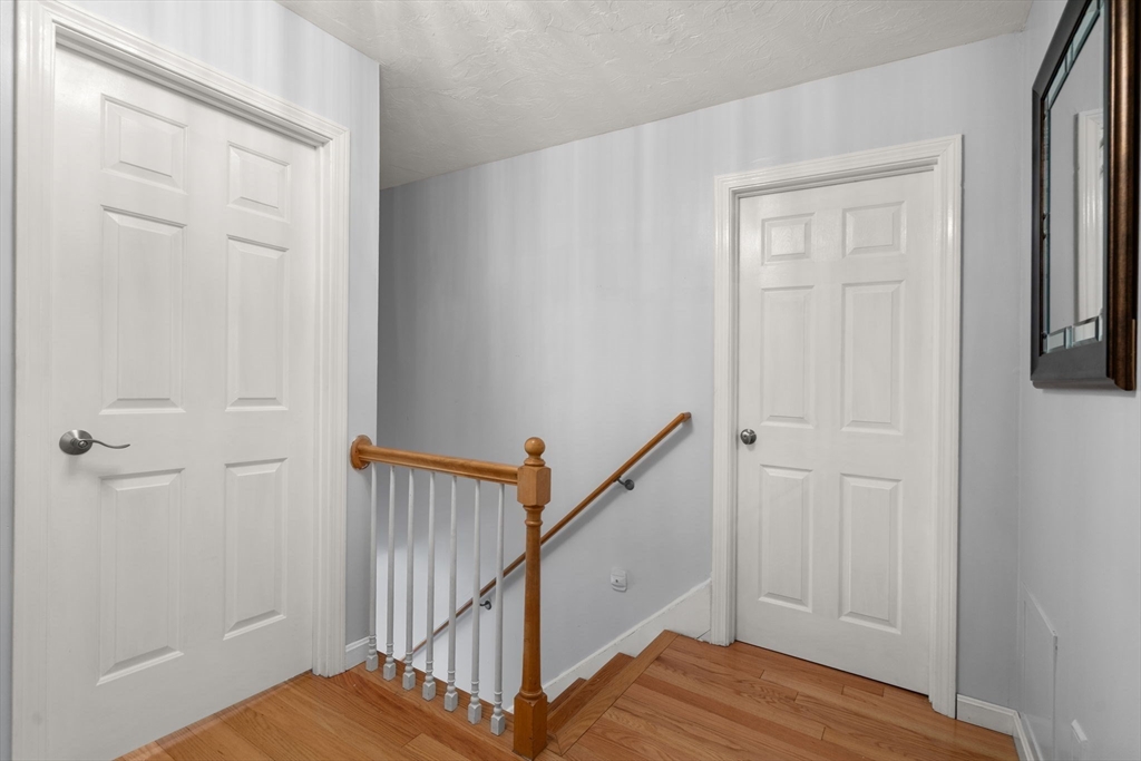11 Cow Hill Road Sharon, MA 02067 - Photo 20 of 30 a view of a hallway with wooden floor and entryway