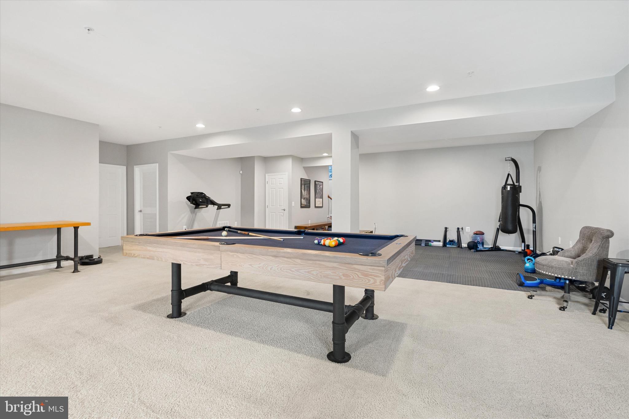 9817 Traver Street Bowie, MD 20721 - Photo 21 of 23 Pool table is no match for this spacious basement.