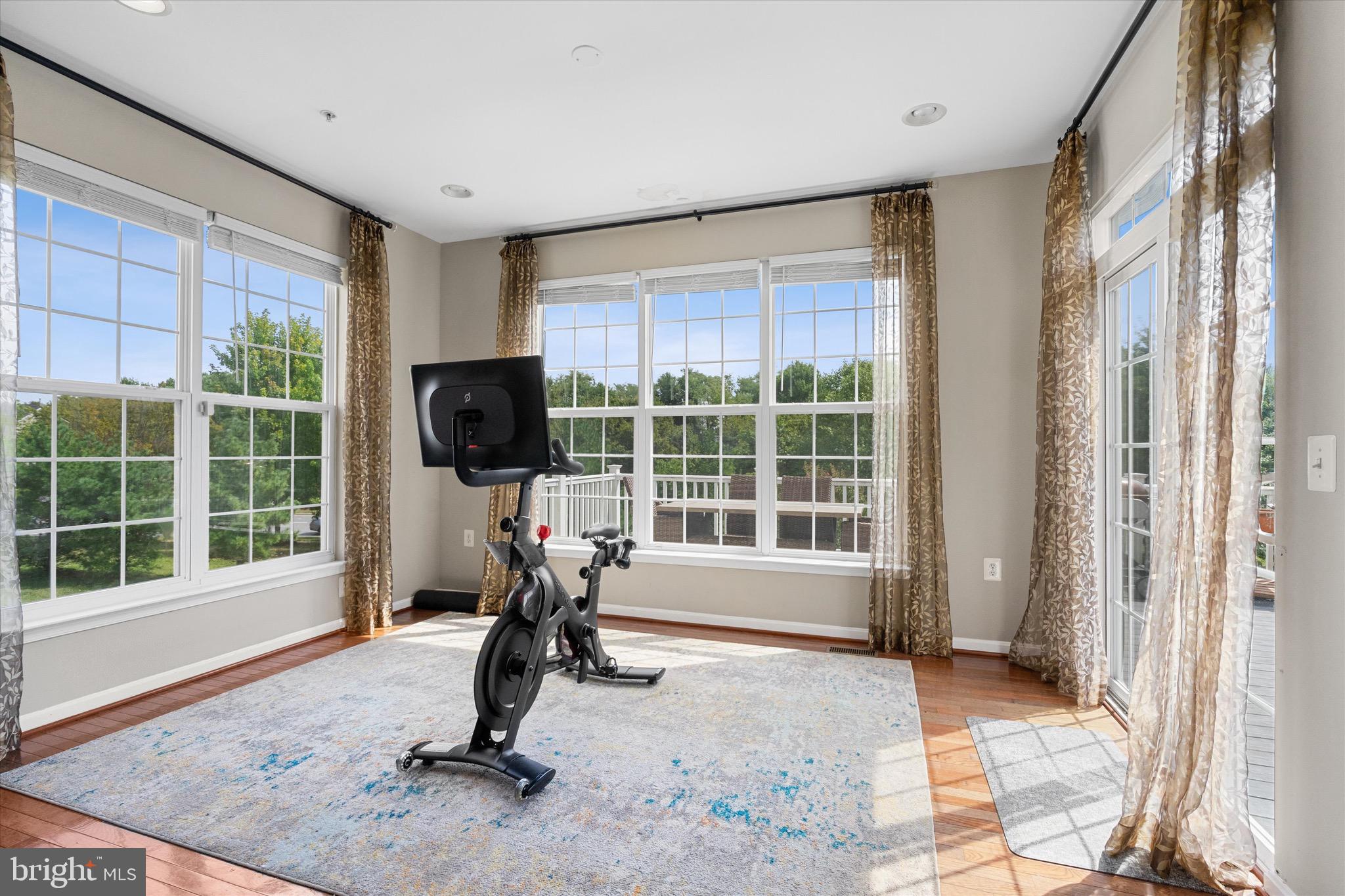 9817 Traver Street Bowie, MD 20721 - Photo 9 of 23 Bright and Airy Sunroom leading to massive deck