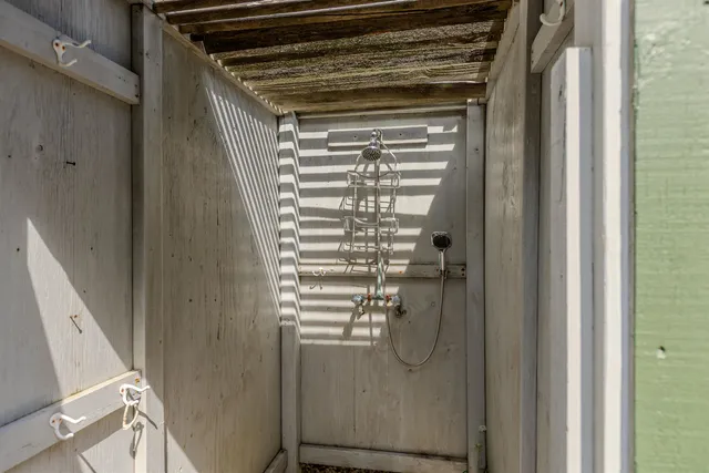 a view of a backyard with pathway