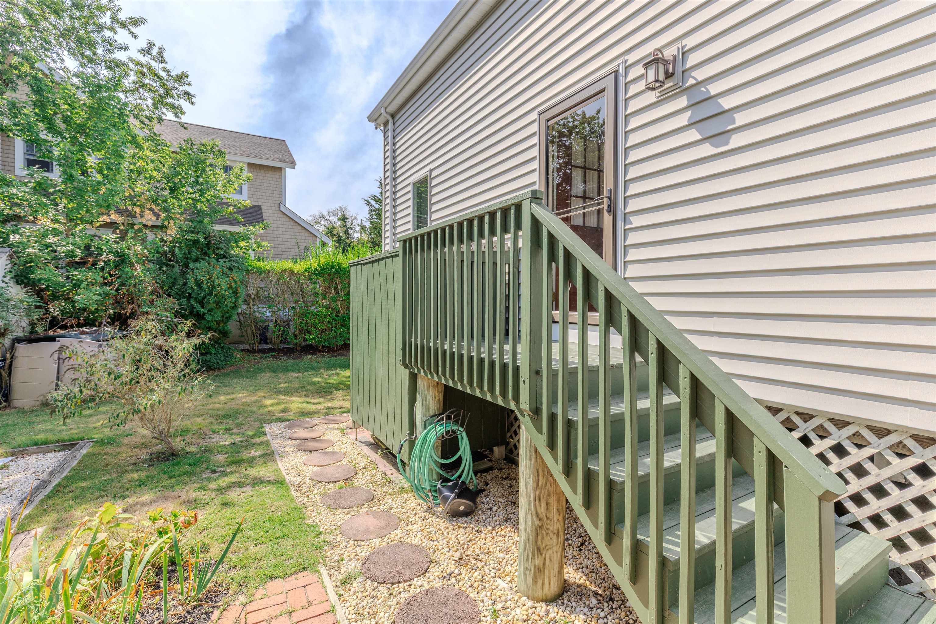 323 Alexander Avenue Cape May Point, NJ 08212 - Photo 42 of 50 a view of balcony and garden