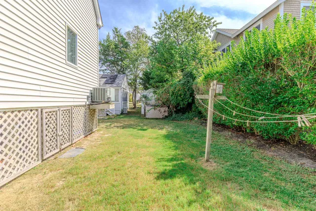 a view of a yard with an ocean beach