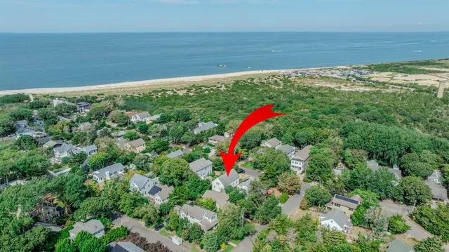 a view of a houses and a yard