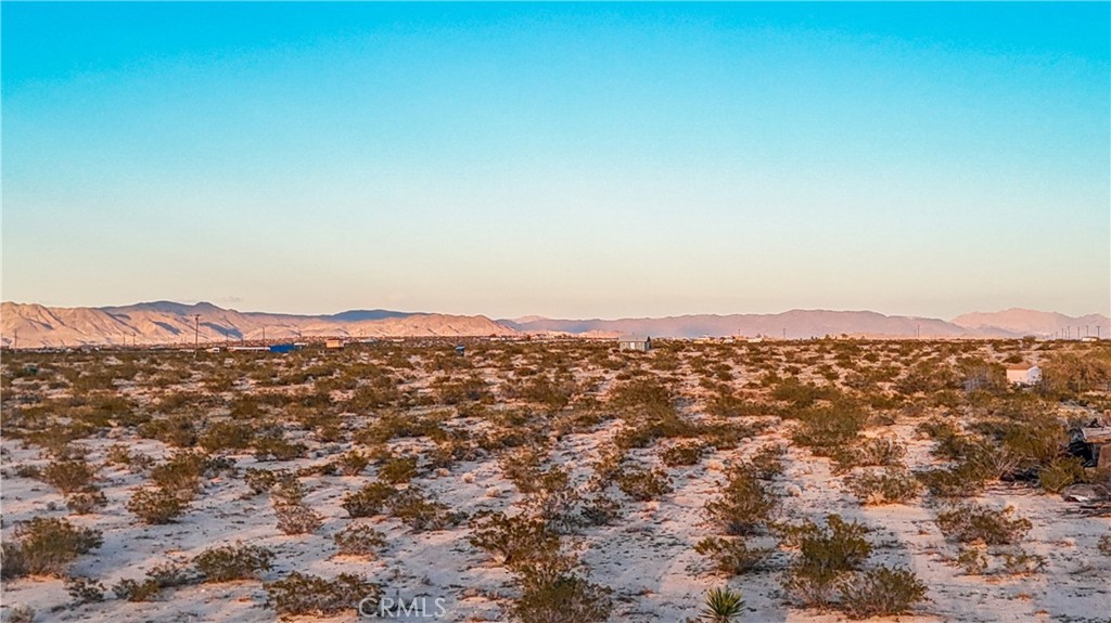 0 Cypress Rd. Road Joshua Tree, CA 92252 - Photo 23 of 33 an aerial view of mountain with trees in the background