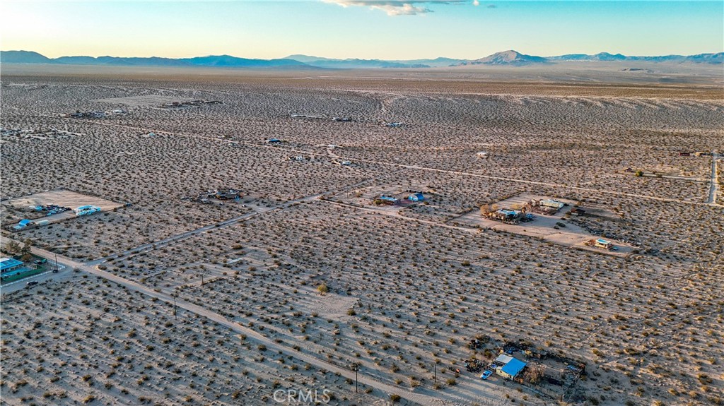 0 Cypress Rd. Road Joshua Tree, CA 92252 - Photo 8 of 33 a view of an ocean and a mountain