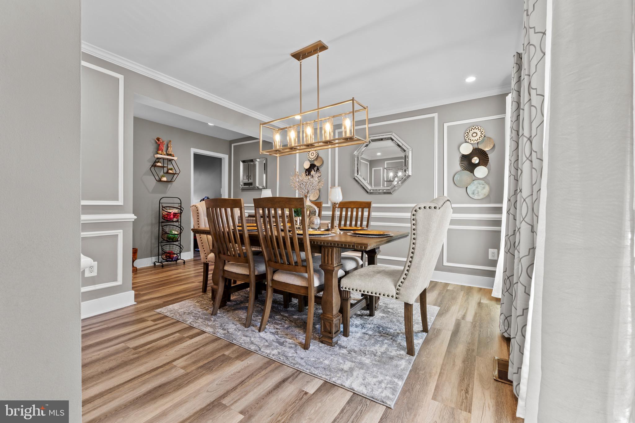 1735 Canal Run Drive Point of Rocks, MD 21777 - Photo 12 of 59 a view of a dining room with furniture and a chandelier