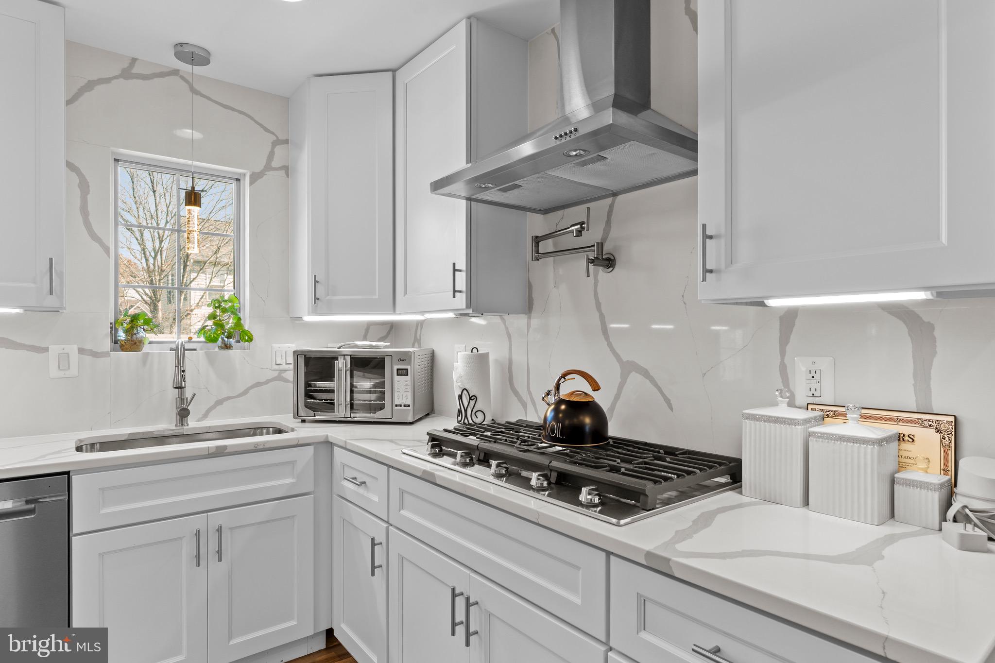 1735 Canal Run Drive Point of Rocks, MD 21777 - Photo 18 of 59 a stove top oven sitting inside of a kitchen