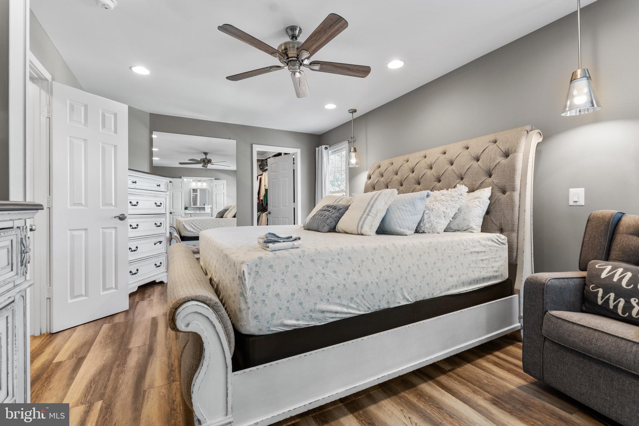 1735 Canal Run Drive Point of Rocks, MD 21777 - Photo 27 of 59 a bedroom with a large bed and furniture