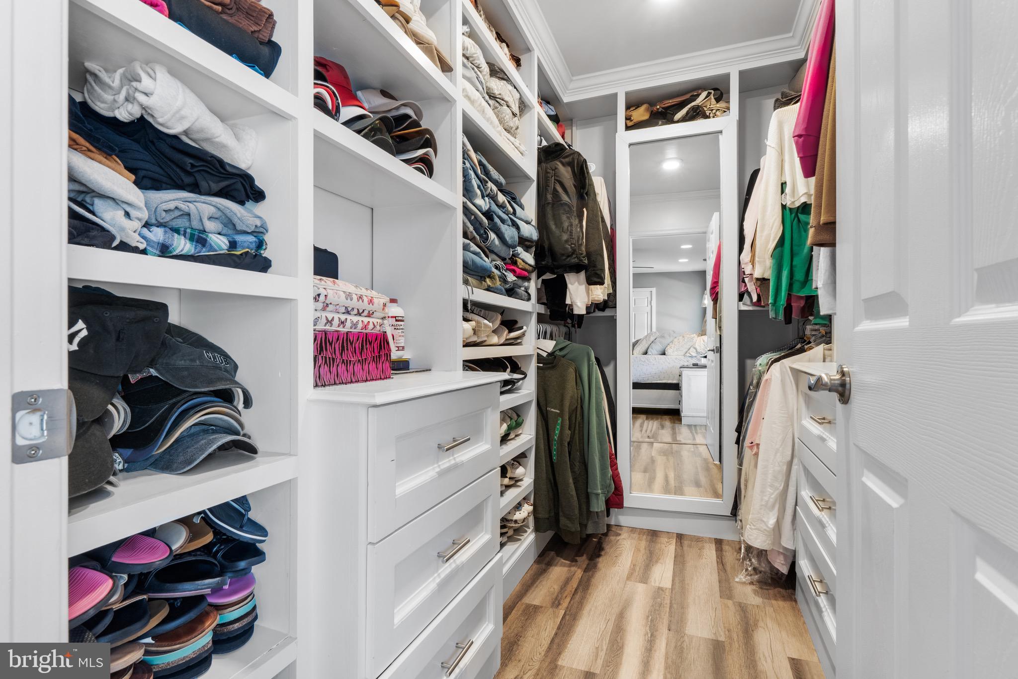 1735 Canal Run Drive Point of Rocks, MD 21777 - Photo 29 of 59 a view of walk in closet with clothes and shoes