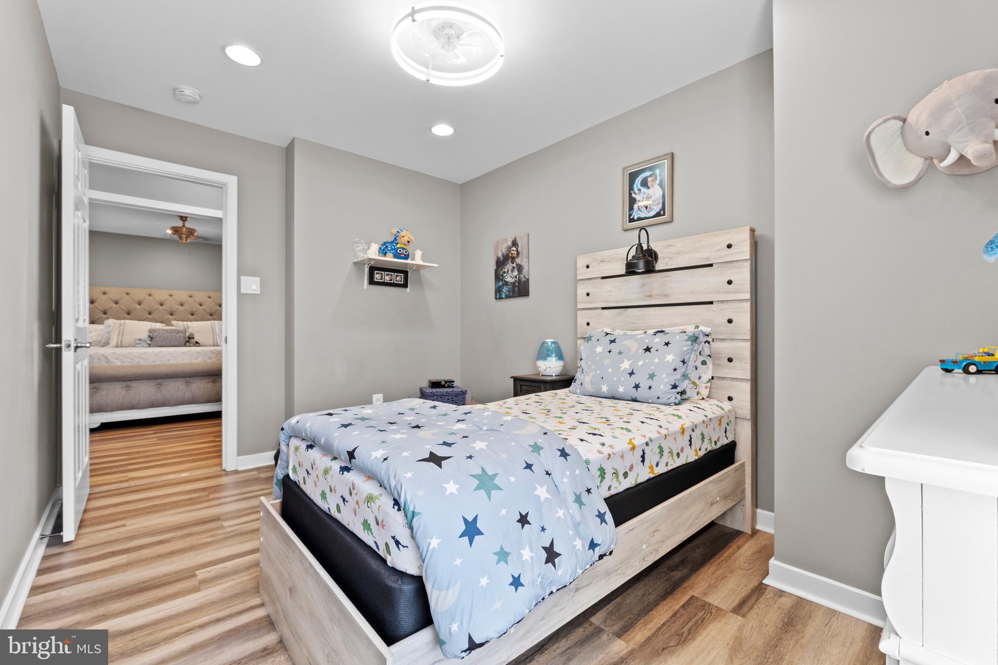 1735 Canal Run Drive Point of Rocks, MD 21777 - Photo 39 of 59 a bedroom with a bed and a walk in closet