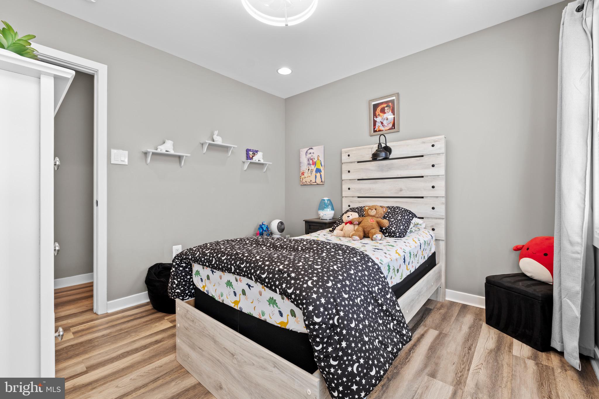 1735 Canal Run Drive Point of Rocks, MD 21777 - Photo 40 of 59 a bedroom with a bed and a dresser