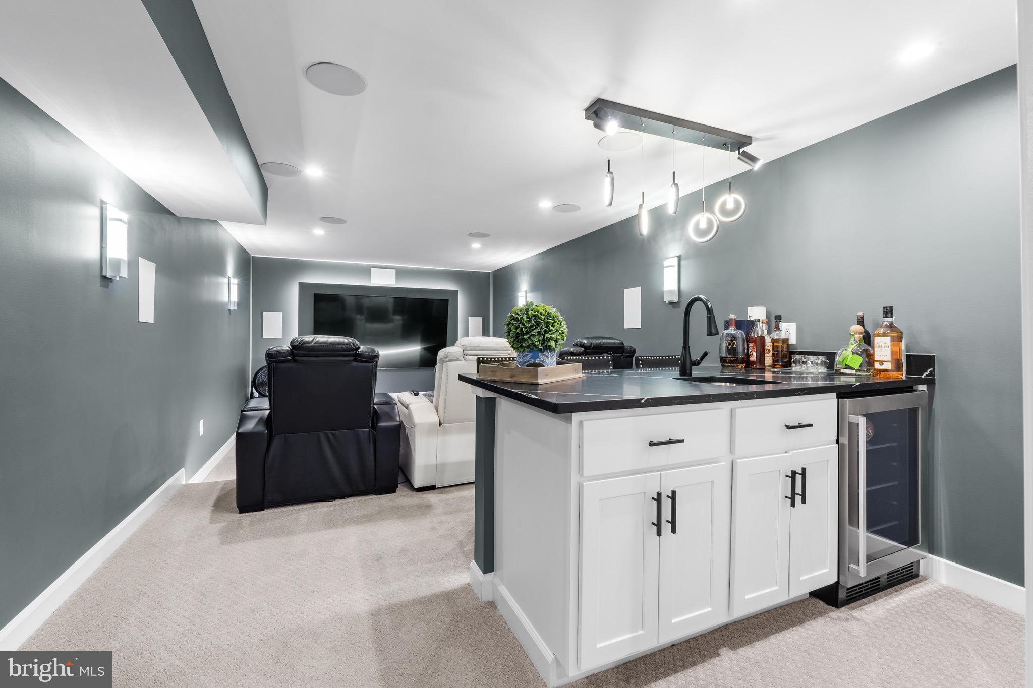 1735 Canal Run Drive Point of Rocks, MD 21777 - Photo 49 of 59 a kitchen with stainless steel appliances kitchen island granite countertop a refrigerator and a sink