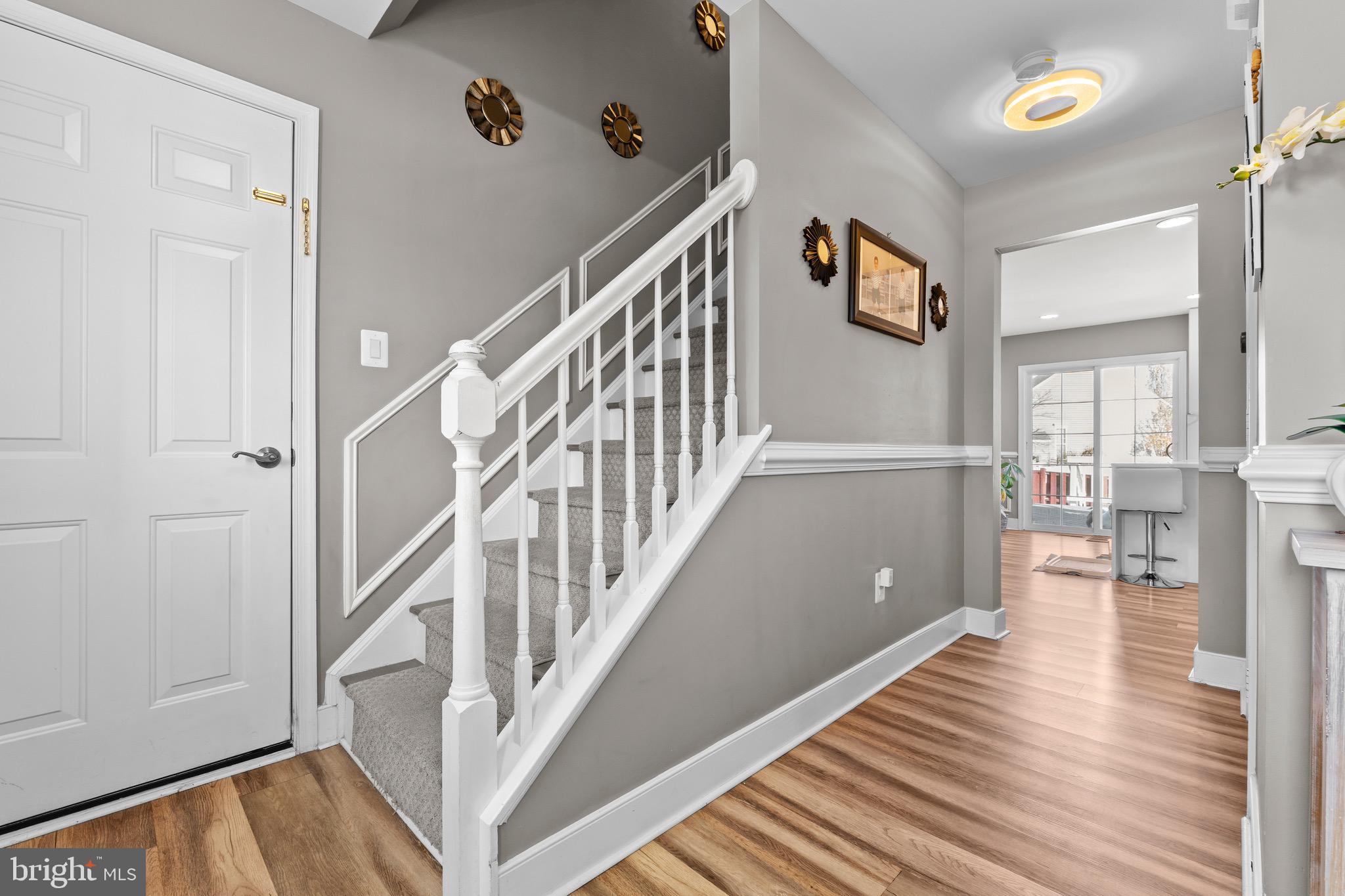 1735 Canal Run Drive Point of Rocks, MD 21777 - Photo 9 of 59 a view of a hallway with wooden floor and staircase