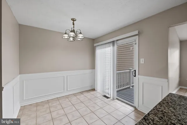 a view of a room with white walls