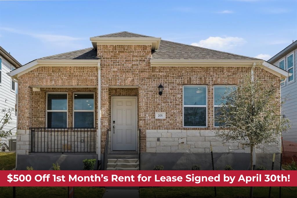 Brick and stone facade residence featuring a covered front porch with iron railings, a paneled entry door, and multiple windows with blinds